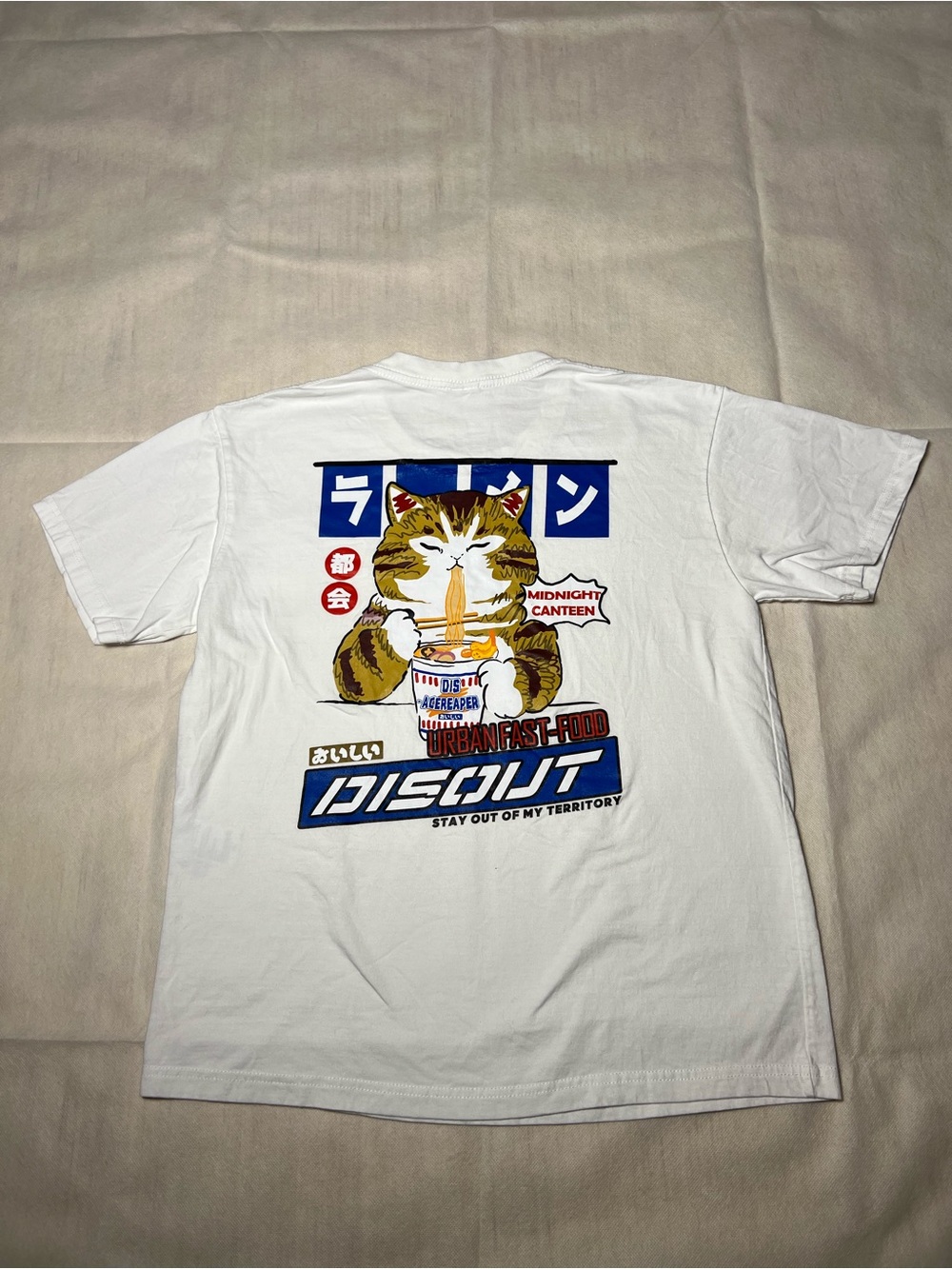 Disout white cat graphic tee with cat holding a cup with chopsticks